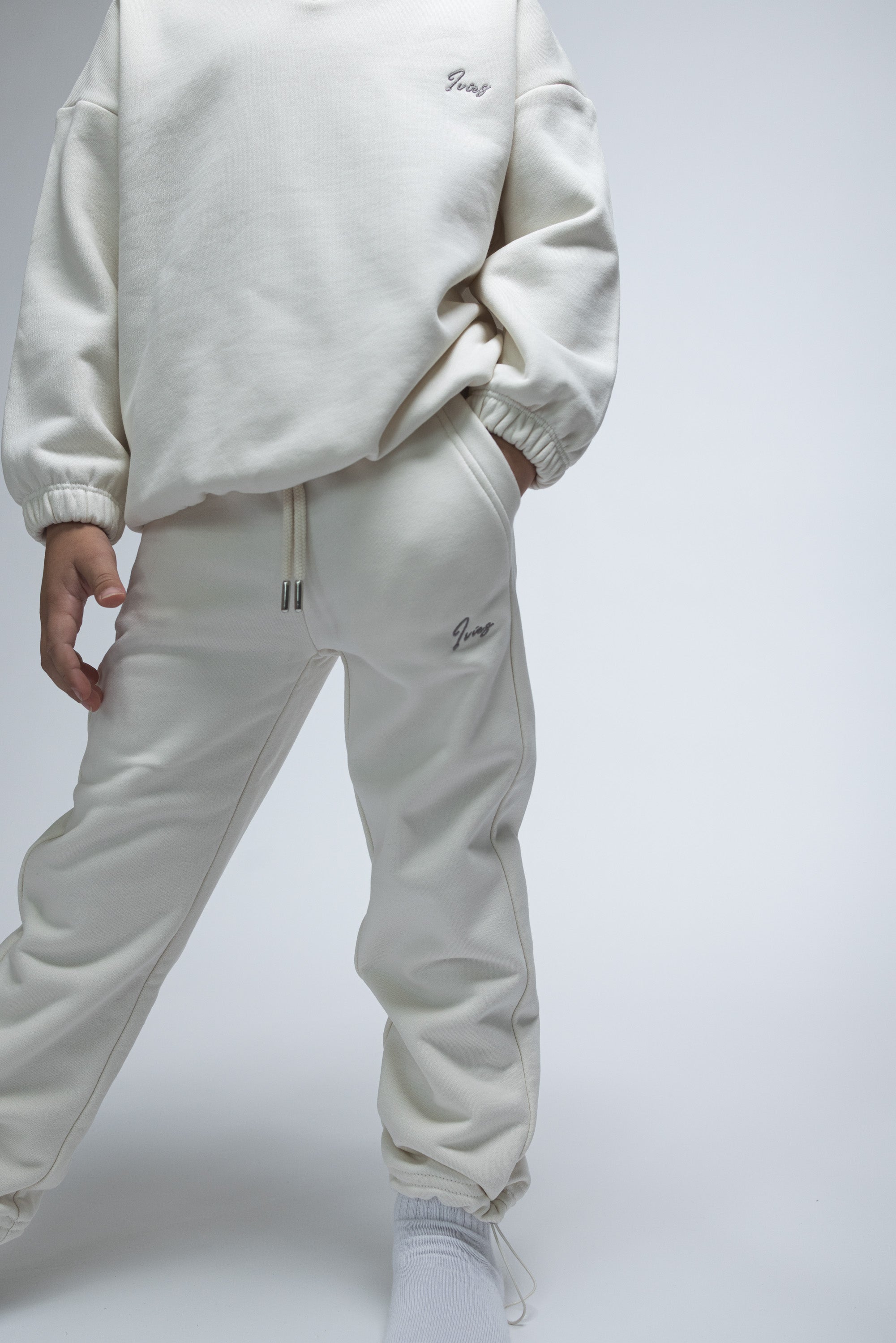 PANTALON JOGGING À LIENS DE SERRAGE ET OURLET AJUSTABLE