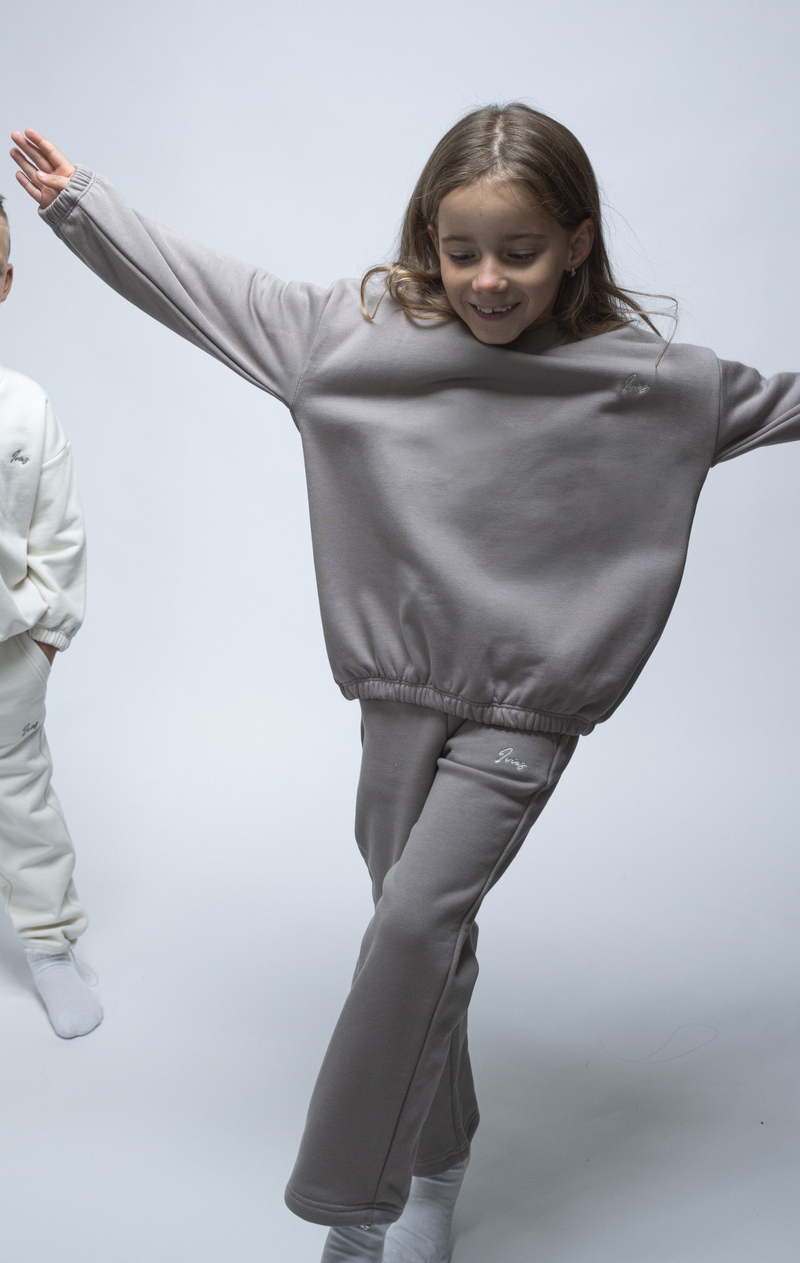 PANTALON JOGGING À LIENS DE SERRAGE ET OURLET AJUSTABLE